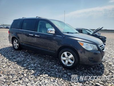 Czwarte zdjęcie samochodu z boku: 2012 VOLKSWAGEN ROUTAN SEL PREMIUM VIN:2C4RVADG9CR321535 - miniatura