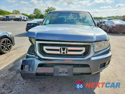 Piąte zdjęcie samochodu w środku: 2010 HONDA RIDGELINE RTS VIN:5FPYK1F42AB001061 - miniatura