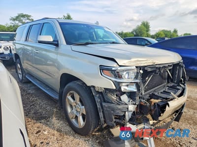 Czwarte zdjęcie samochodu z boku: 2015 CHEVROLET SUBURBAN K1500 LT VIN:1GNSKJKC3FR566312 - miniatura