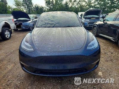 Piąte zdjęcie samochodu w środku: 2023 TESLA MODEL Y VIN:7SAYGDEF5PF978981 - miniatura