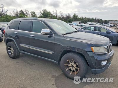 Czwarte zdjęcie samochodu z boku: 2011 JEEP GRAND CHEROKEE LIMITED VIN:1J4RR5GG1BC552096 - miniatura
