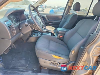 Zdjęcie 7 z 13 samochodu: 2002 JEEP GRAND CHEROKEE LAREDO VIN:1J4GW48N12C183036 - miniatura