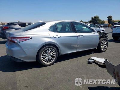 Trzecie zdjęcie samochodu z tyłu: 2019 TOYOTA CAMRY HYBRID XLE VIN:4T1B21HK2KU517712 - miniatura