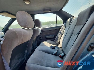 Zdjęcie 10 z 12 samochodu: 1994 TOYOTA COROLLA DX VIN:1NXAE09B9RZ135070 - miniatura