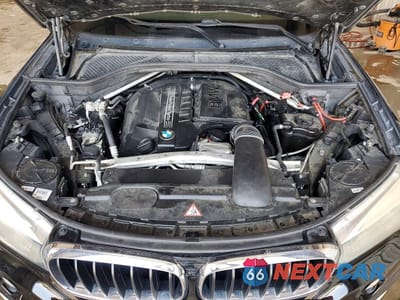 Zdjęcie 12 z 13 samochodu: 2014 BMW X5 XDRIVE35I VIN:5UXKR0C59E0H22954 - miniatura