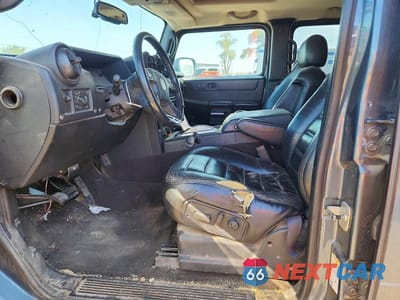Zdjęcie 7 z 13 samochodu: 2005 HUMMER H2 VIN:5GRGN23U15H116518 - miniatura