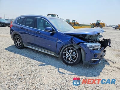 Czwarte zdjęcie samochodu z boku: 2017 BMW X1 XDRIVE28I VIN:WBXHT3C35H5F82411 - miniatura