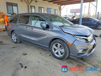 Czwarte zdjęcie samochodu z boku: 2019 HONDA ODYSSEY EX VIN:5FNRL6H5XKB032346 - miniatura
