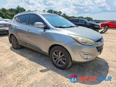 Czwarte zdjęcie samochodu z boku: 2015 HYUNDAI TUCSON SE VIN:KM8JU3AG3FU073429 - miniatura