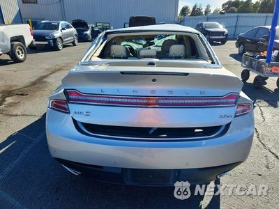 Zdjęcie 6 z 12 samochodu: 2014 LINCOLN MKZ HYBRID VIN:3LN6L2LU3ER809765 - miniatura