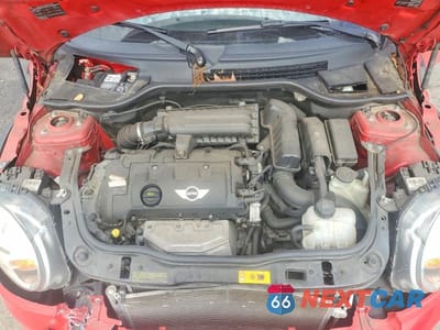 Zdjęcie 11 z 12 samochodu: 2013 MINI COOPER VIN:WMWSU3C58DT685128 - miniatura
