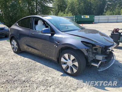 Czwarte zdjęcie samochodu z boku: 2021 TESLA MODEL Y VIN:5YJYGAEE8MF301504 - miniatura