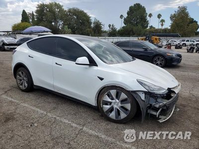 Czwarte zdjęcie samochodu z boku: 2022 TESLA MODEL Y VIN:7SAYGDEE9NF354153 - miniatura
