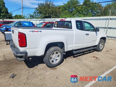 Trzecie zdjęcie samochodu z tyłu: 2021 CHEVROLET COLORADO VIN:1GCHTBEAXM1187366 - miniatura