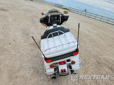 Czwarte zdjęcie samochodu z boku: 2005 HARLEY-DAVIDSON FLHTCUI VIN:1HD1FCW165Y673399 - miniatura