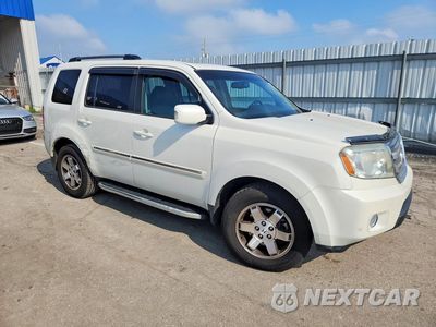 Czwarte zdjęcie samochodu z boku: 2011 HONDA PILOT TOURING VIN:5FNYF4H94BB040193 - miniatura