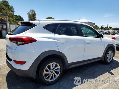Trzecie zdjęcie samochodu z tyłu: 2016 HYUNDAI TUCSON SE VIN:KM8J33A48GU180213 - miniatura