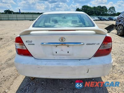 Zdjęcie 6 z 12 samochodu: 2003 TOYOTA CAMRY LE VIN:4T1BE32K93U229764 - miniatura