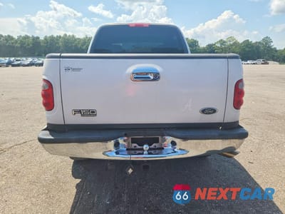 Zdjęcie 6 z 12 samochodu: 2001 FORD F150 SUPERCREW VIN:1FTRW08L31KB97658 - miniatura
