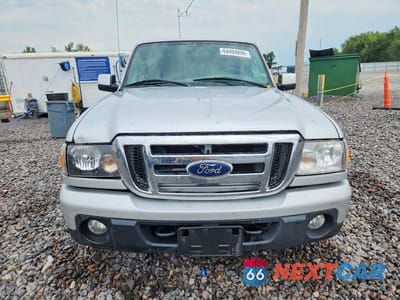 Piąte zdjęcie samochodu w środku: 2011 FORD RANGER SUPER CAB VIN:1FTLR4FE7BPA56296 - miniatura