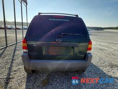 Zdjęcie 6 z 13 samochodu: 2002 FORD ESCAPE XLT VIN:1FMYU03182KE08700 - miniatura