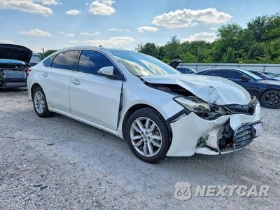 Czwarte zdjęcie samochodu z boku: 2014 TOYOTA AVALON XLE VIN:4T1BK1EB5EU135649 - miniatura