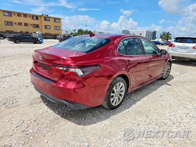 Trzecie zdjęcie samochodu z tyłu: 2022 TOYOTA CAMRY LE VIN:4T1C11AK2NU642246 - miniatura