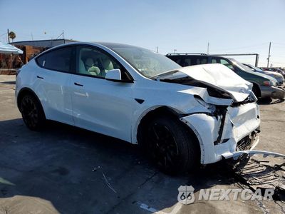 Czwarte zdjęcie samochodu z boku: 2024 TESLA MODEL Y VIN:7SAYGDEE5RA265408 - miniatura