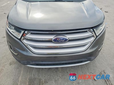 Zdjęcie 12 z 13 samochodu: 2016 FORD EDGE SEL VIN:2FMPK3J98GBB56458 - miniatura
