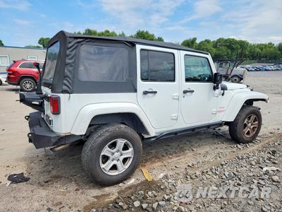 Trzecie zdjęcie samochodu z tyłu: 2014 JEEP WRANGLER UNLIMITED SAHARA VIN:1C4BJWEG9EL209712 - miniatura