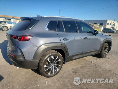 Trzecie zdjęcie samochodu z tyłu: 2026 MAZDA CX-50 PREMIUM PLUS VIN:7MMVAAEW0TN160778 - miniatura