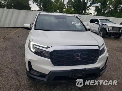 Piąte zdjęcie samochodu w środku: 2022 HONDA PASSPORT EXL VIN:5FNYF7H50NB006254 - miniatura