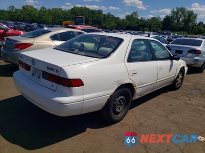 Trzecie zdjęcie samochodu z tyłu: 1999 TOYOTA CAMRY LE V6 VIN:JT2BF22K0X0203894 - miniatura