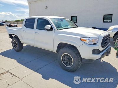 Czwarte zdjęcie samochodu z boku: 2022 TOYOTA TACOMA SR V6 VIN:3TMCZ5AN0NM514056 - miniatura