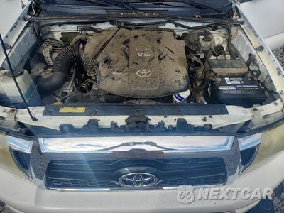 Zdjęcie 11 z 12 samochodu: 2011 TOYOTA TACOMA V6 VIN:3TMLU4EN1BM067784 - miniatura