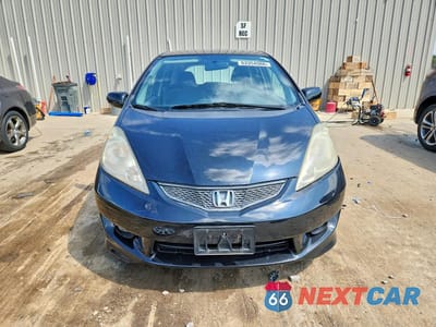 Piąte zdjęcie samochodu w środku: 2009 HONDA FIT SPORT VIN:JHMGE88409S046000 - miniatura