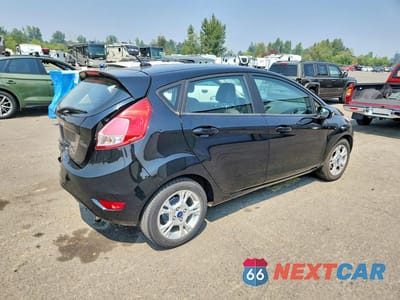 Trzecie zdjęcie samochodu z tyłu: 2016 FORD FIESTA SE VIN:3FADP4EJ9GM122391 - miniatura