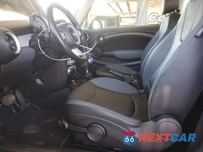 Zdjęcie 7 z 12 samochodu: 2010 MINI COOPER VIN:WMWMF3C51ATZ66394 - miniatura