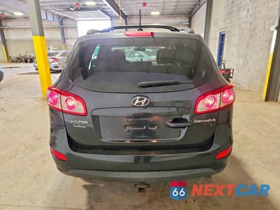 Zdjęcie 6 z 12 samochodu: 2010 HYUNDAI SANTA FE GLS VIN:5NMSGDAB8AH412891 - miniatura