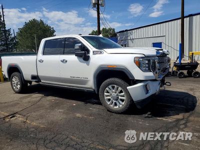 Czwarte zdjęcie samochodu z boku: 2021 GMC SIERRA K2500 DENALI VIN:1GT49REYXMF181833 - miniatura