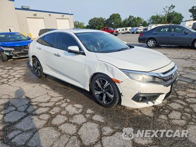 Czwarte zdjęcie samochodu z boku: 2017 HONDA CIVIC TOURING VIN:19XFC1F9XHE000412 - miniatura