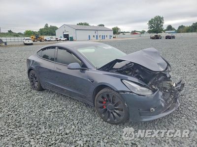 Czwarte zdjęcie samochodu z boku: 2023 TESLA MODEL 3 VIN:5YJ3E1EC6PF480791 - miniatura