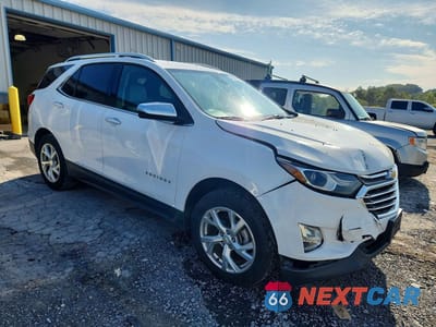 Czwarte zdjęcie samochodu z boku: 2018 CHEVROLET EQUINOX PREMIER VIN:3GNAXVEV6JS630558 - miniatura
