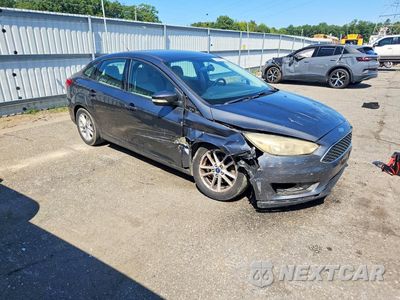 Czwarte zdjęcie samochodu z boku: 2016 FORD FOCUS SE VIN:1FADP3F20GL377417 - miniatura