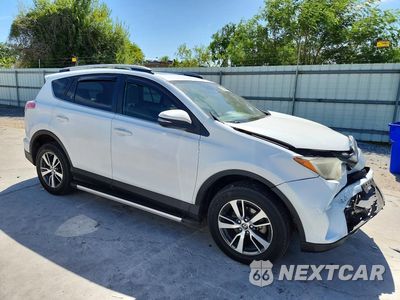 Czwarte zdjęcie samochodu z boku: 2018 TOYOTA RAV4 XLE VIN:JTMWFREV5JD109033 - miniatura
