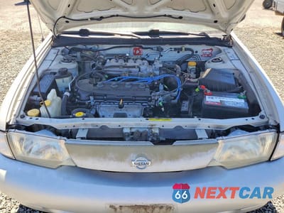 Zdjęcie 11 z 12 samochodu: 1999 NISSAN SENTRA XE VIN:1N4AB41D4XC729673 - miniatura