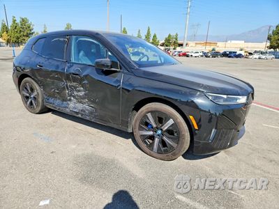 Czwarte zdjęcie samochodu z boku: 2024 BMW IX XDRIVE50 VIN:WB523CF03RCR52765 - miniatura