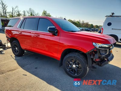 Czwarte zdjęcie samochodu z boku: 2022 CHEVROLET TAHOE K1500 VIN:1GNSKLED6NR302855 - miniatura