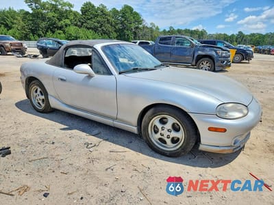 Czwarte zdjęcie samochodu z boku: 1999 MAZDA MX-5 MIATA VIN:JM1NB353XX0100220 - miniatura
