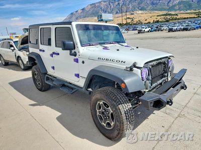 Czwarte zdjęcie samochodu z boku: 2016 JEEP WRANGLER UNLIMITED RUBICON VIN:1C4BJWFG2GL265718 - miniatura